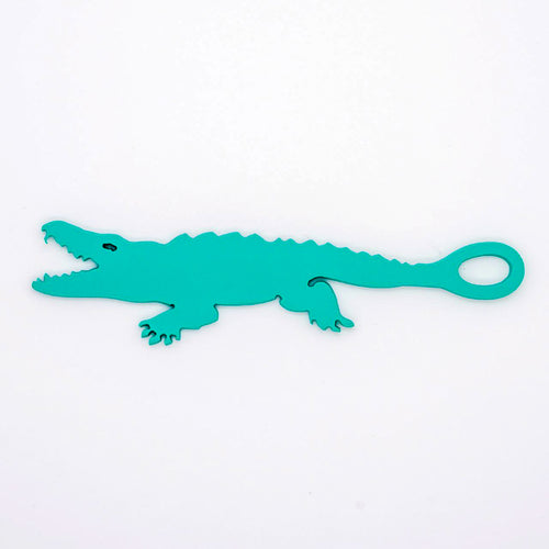 Alligator shaped goggle tag to identify your goggles when you leave them on the pool deck. Get your Swim Loops goggle tags at www.swimloops.com.