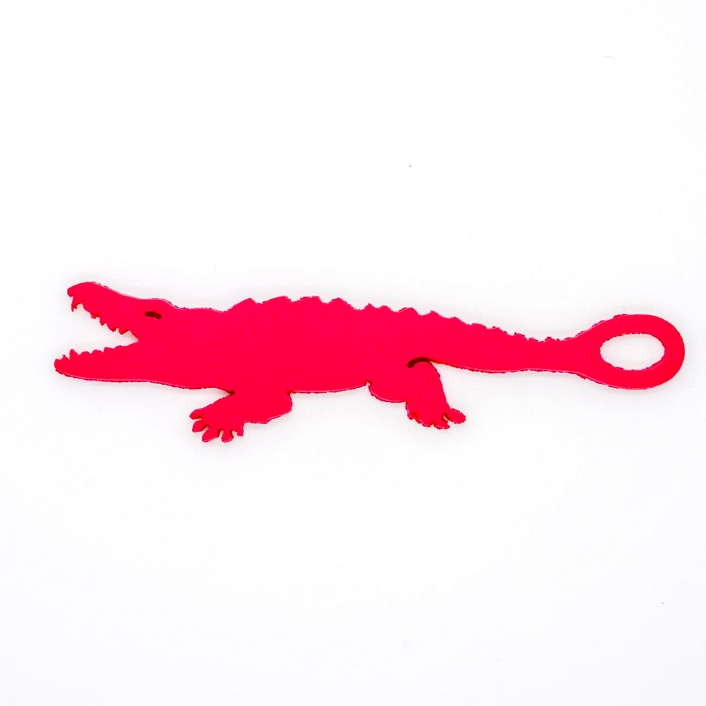 Alligator shaped goggle tag to identify your goggles when you leave them on the pool deck. Get your Swim Loops goggle tags at www.swimloops.com.
