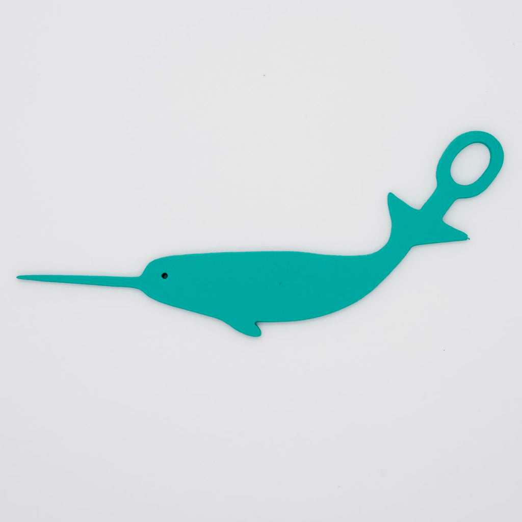 Sea foam green narwhal shaped Swim Loops goggle tag to label swim goggles