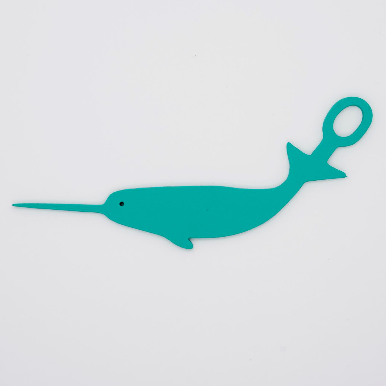 Sea foam green narwhal shaped Swim Loops goggle tag to label swim goggles