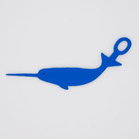Blue narwhal shaped Swim Loops goggle tag to label swim goggles