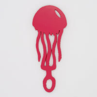 Dark pink jellyfish shaped Swim Loops goggle tag to label swim goggles