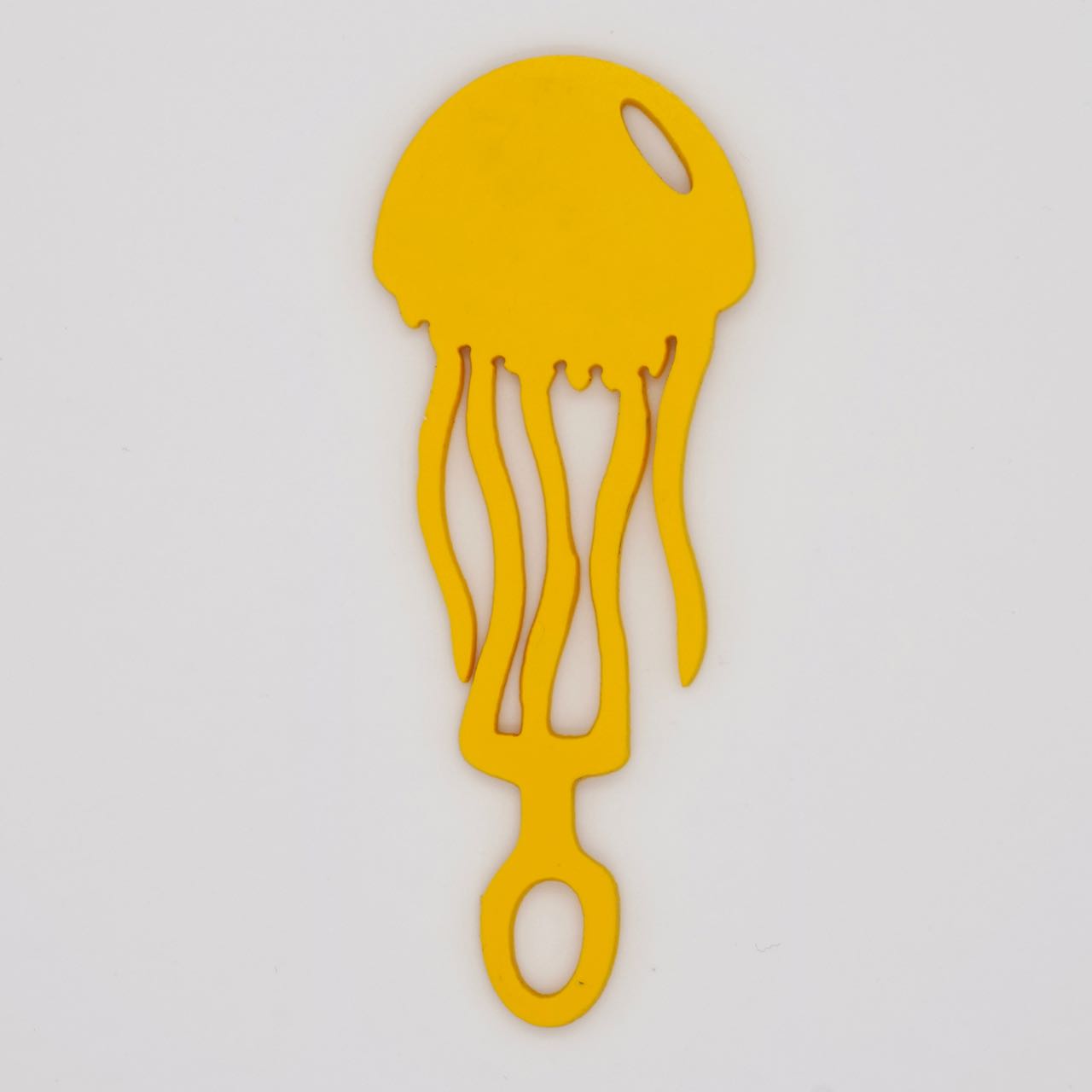 Yellow jellyfish shaped Swim Loops goggle tag to label swim goggles