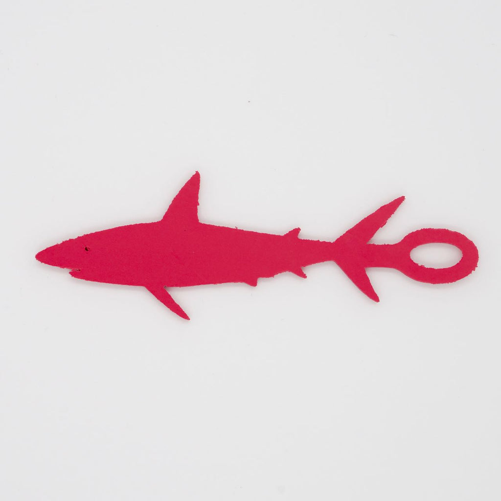 Dark pink shark shaped Swim Loops goggle tag to label swim goggles
