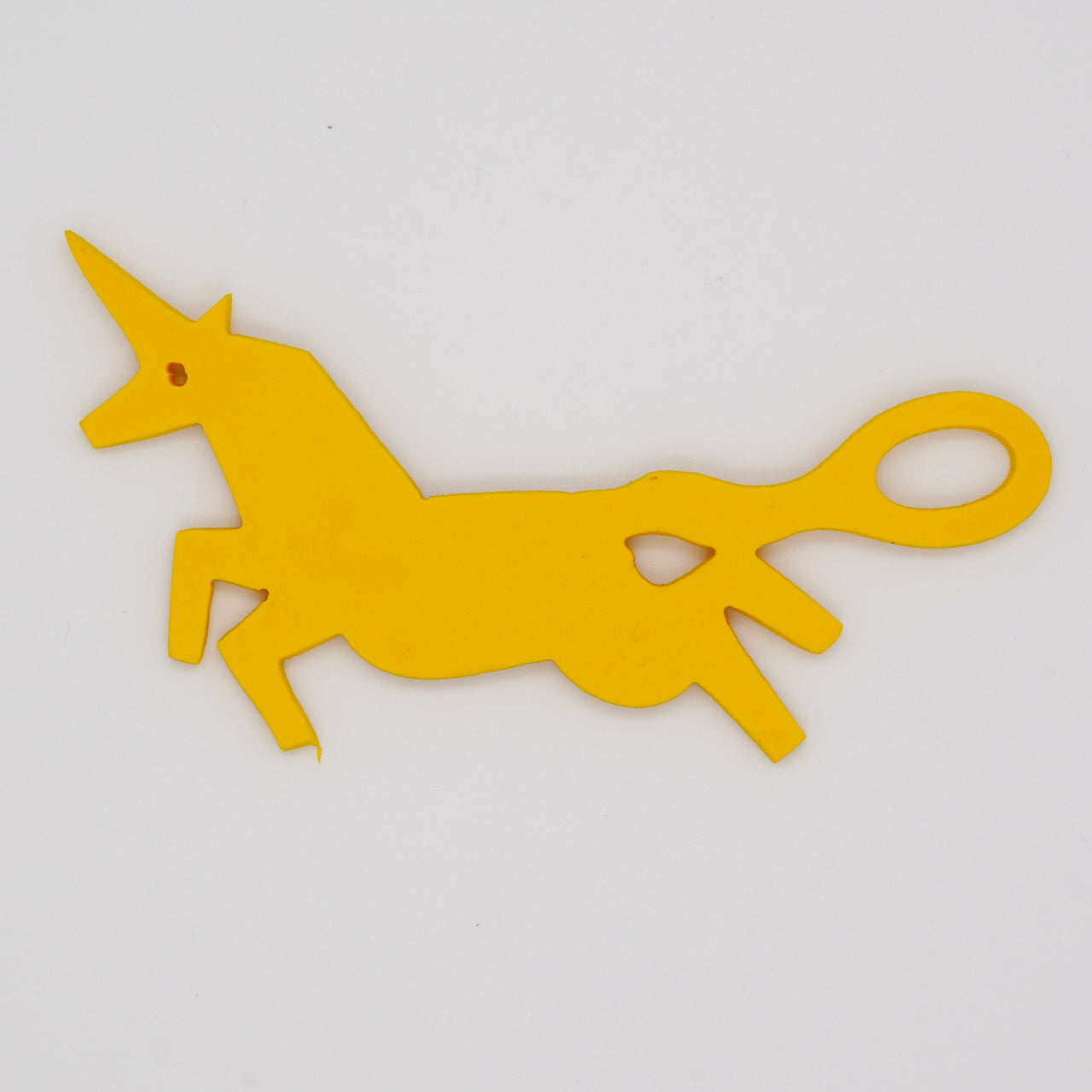 Yellow unicorn shaped Swim Loops goggle tag to label swim goggles