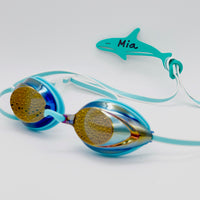 Sea foam green orca shaped Swim Loops goggle tag to label swim goggles with name written on it attached to swim goggles