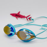 Dark pink shark shaped Swim Loops goggle tag to label swim goggles with name written on it attached to swim goggles