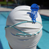 Blue jellyfish shaped Swim Loops goggle tag for labeling swim goggles attached to swim goggles on swimmers head