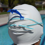 Blue dolphin shaped Swim Loops goggle tag to label swim goggles attached to swim goggles on swimmers head